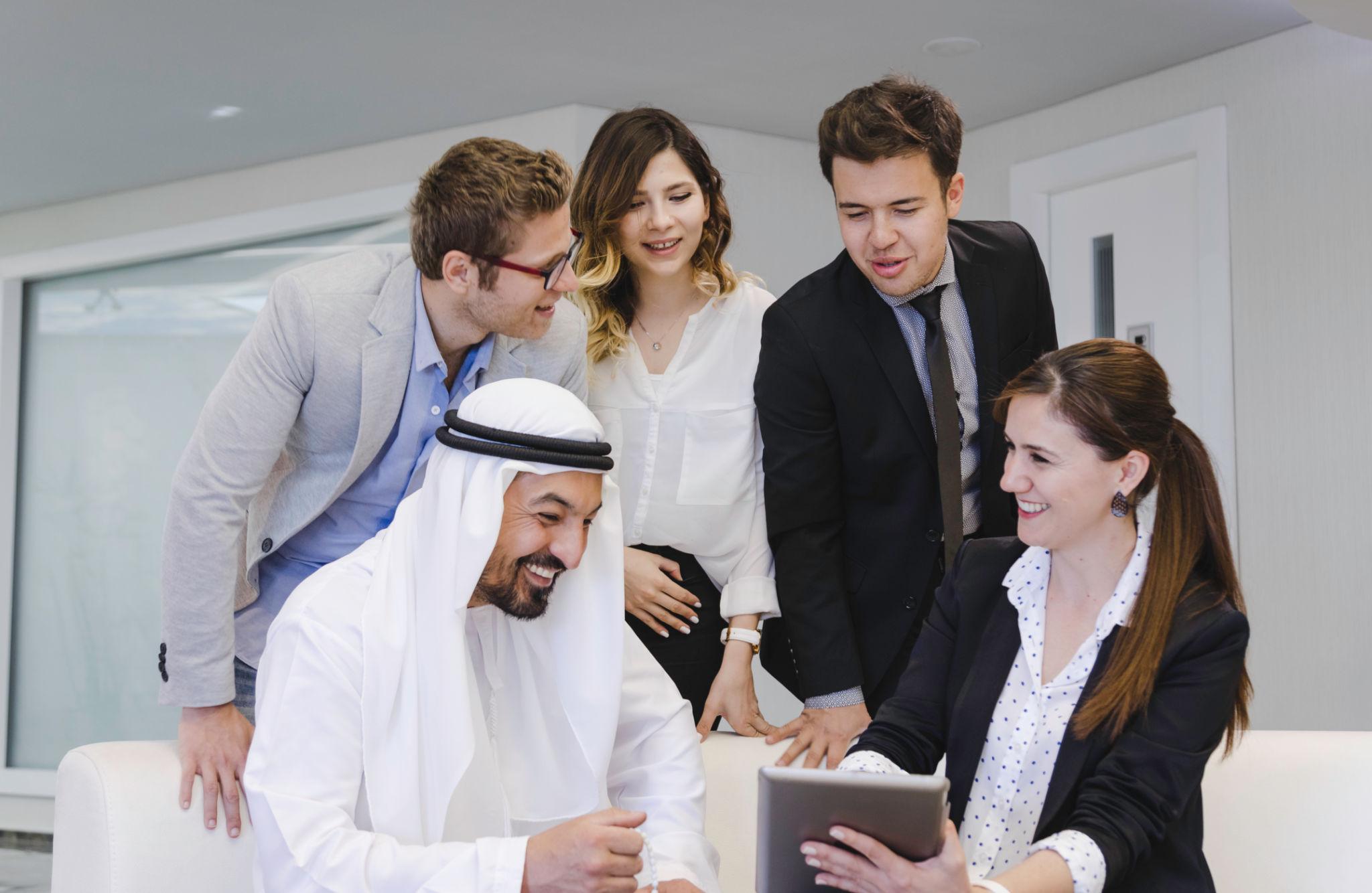 Dubai business professionals shaking hands